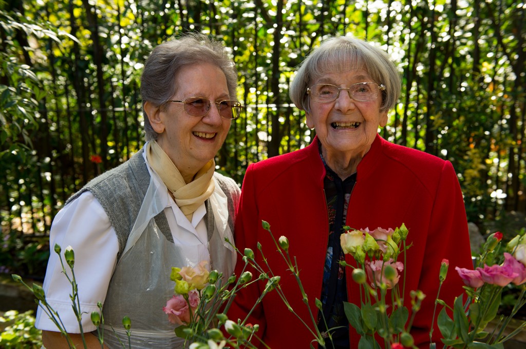 Resident and sister smiling at St Teresa's care home