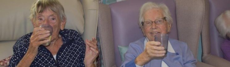Residents at Footherley Hall eating cheese