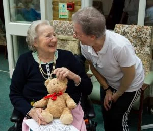 Sister with resident at St Teresas