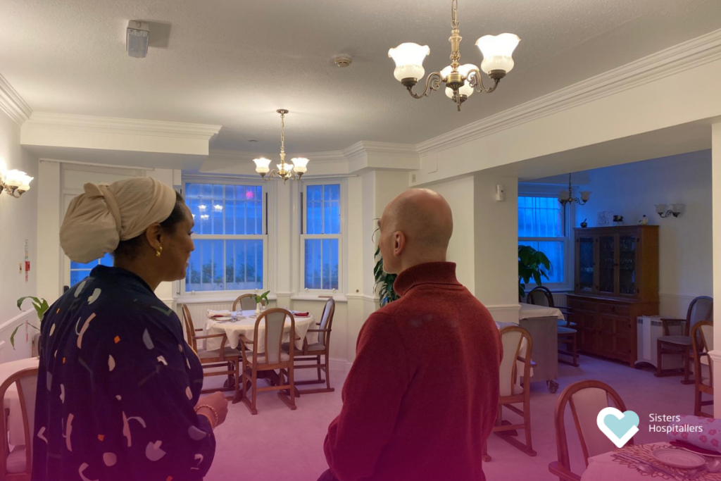 Joan Uribe with the London centre manager during a visit to the centre