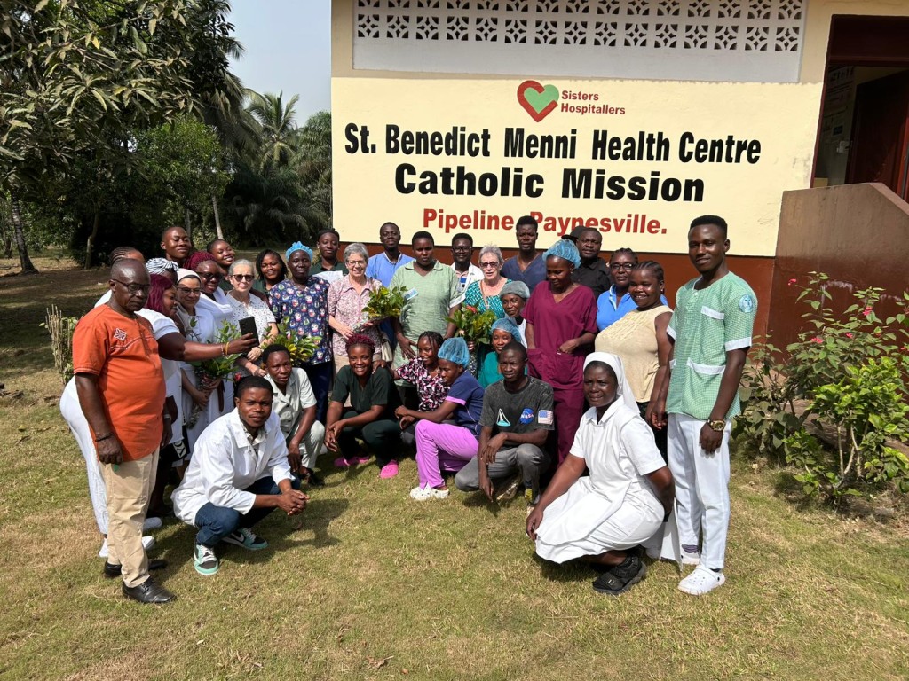 Sisters Hospitallers and staff gathered outside St Benedict Menni Health Centre during the Canonical Visit to Monrovia, Liberia.