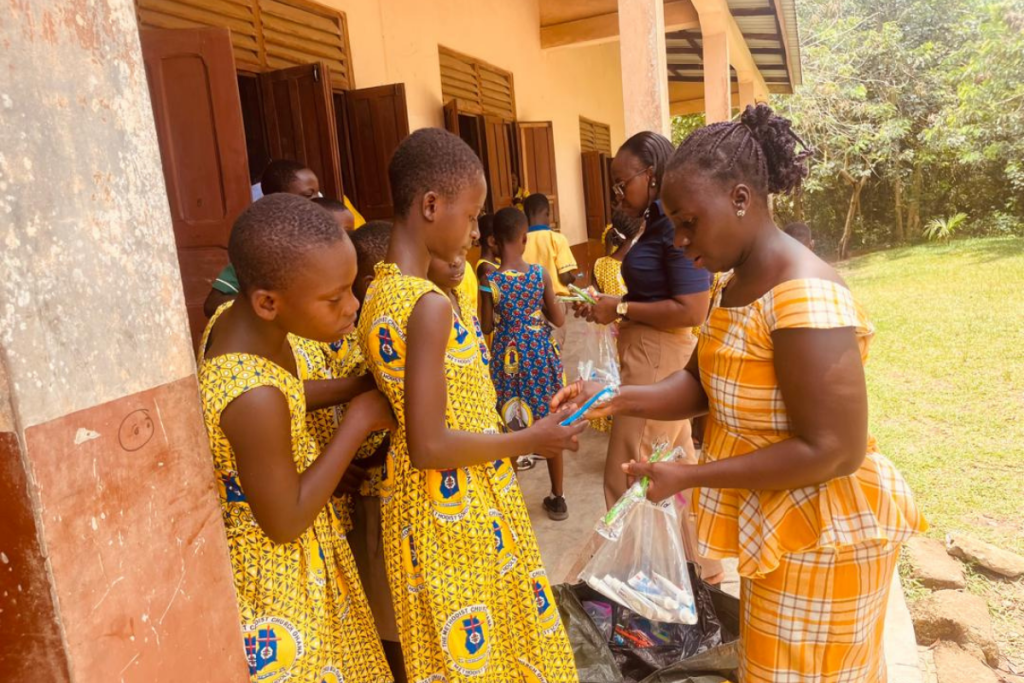 Children receiving toothbrushes during World Oral Health Day outreach in Foso Ghana